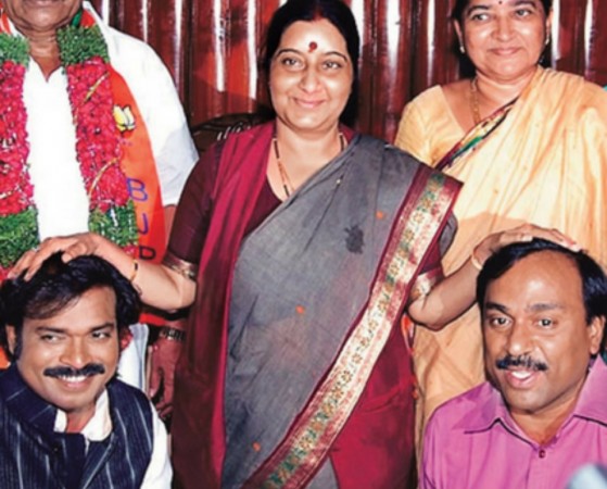 Sushma Swaraj blessing mining czar G Janardhan Reddy and Sritamulu Sushma Swaraj blessing mining czar G Janardhan Reddy and Sritamulu