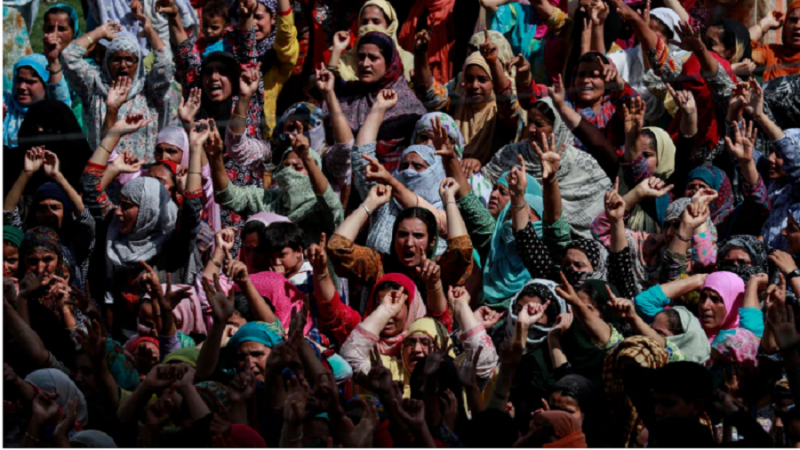 Kashmiri women shout slogans during a protest in Srinagar on Sunday. kashmir eid celebrations