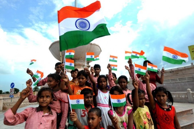 Lucknow: Children holding National Flags celebrate Independence Day, in Lucknow on Aug 14, 2019. Lucknow: Children holding National Flags celebrate Independence Day, in Lucknow on Aug 14, 2019.