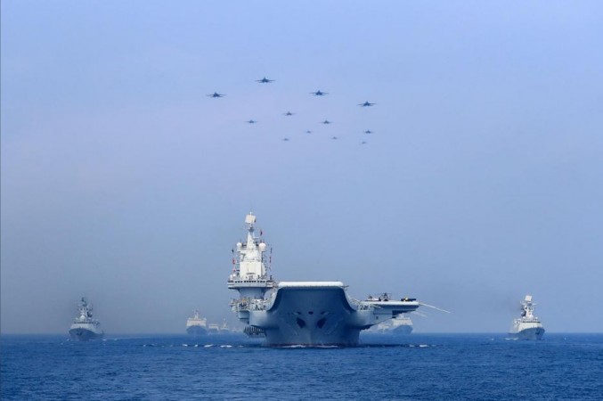 Chinese People's Liberation Army (PLA) Navy take part in a military display in the South China Sea April 12, 2018 South China Sea