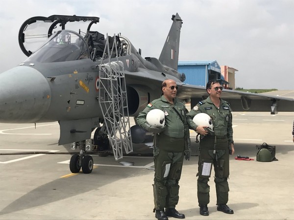 Defence Minister Rajnath Singh gets ready to board the Light Combat Aircraft Tejas of the Air Force (IAF) at HAL airport in Bengaluru. Rajnath Singh flies IAF Light Combat Aircraft Tejas