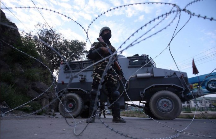 Indian security personnel stands guard in Srinagar, Jammu and Kashmir. Indian Army