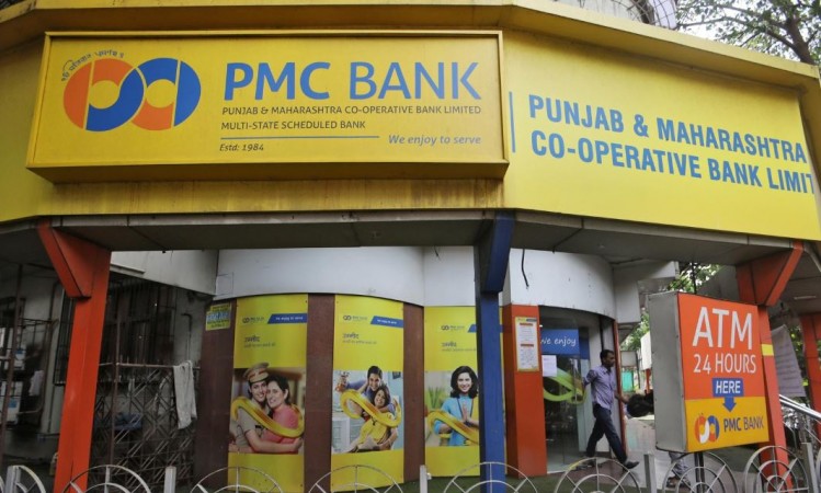 A man walks out from a PMC (Punjab and Maharashtra Co-operative) Bank branch in Mumbai, India, September 26, 2019. REUTERS/Francis Mascarenhas PMC Bank