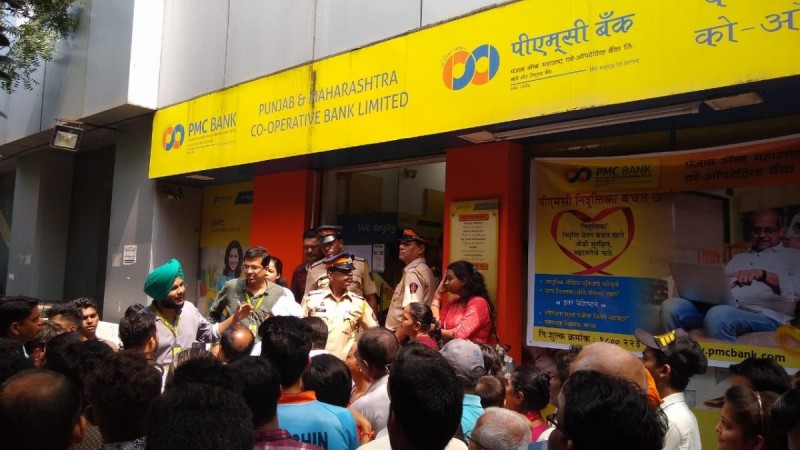 Depositors and investors gather outside Bhandup Branch of the Punjab & Maharashtra Cooperative (PMC) Bank. PMC bank
