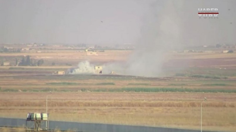 Explosion in the border town of Tel Abyad, Syria, as seen from Akcakale, Turkey October 9, 2019. Turkey