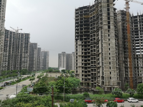Under-construction buildings. Real estate