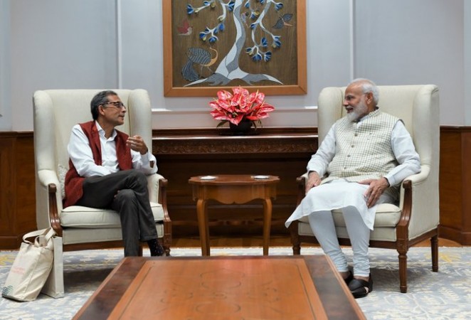 Abhijit Banerjee and PM Narendra Modi. Abhijit Banerjee meets narendra modi