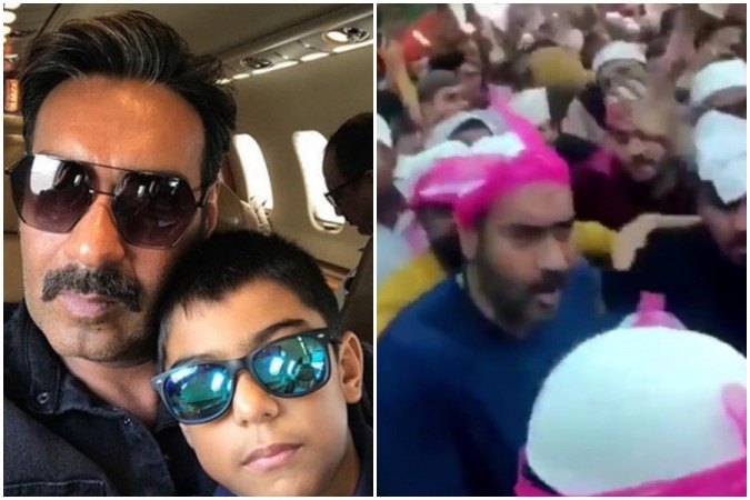 Ajay Devgn and son Yug get mobbed. Ajay Devgn and son Yug get mobbed