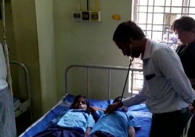 The students were complaining of severe stomach ache midday meal