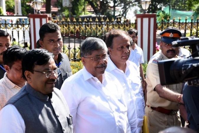 Maharashtra BJP leaders Chandrakant Patil, Sudhir Mungantiwar and Ashish Shelar talk to media persons after meeting the Governor at Raj Bhavan. Maharashtra BJP leaders Chandrakant Patil, Sudhir Mungantiwar and Ashish Shelar talk to media persons after meeting the Governor at Raj Bhavan