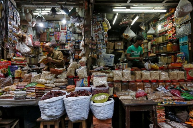 Vendors wait for customers at their respective shops at a retail market in Kolkata, India, December 12, 2018. India retail market