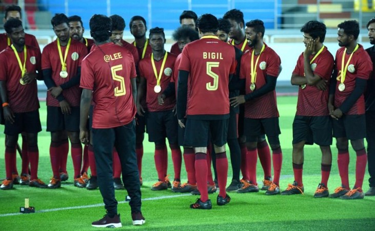 A picture of Atlee Kumar and Vijay during the shooting of Bigil. Atlee Kumar and Vijay on Bigil Sets