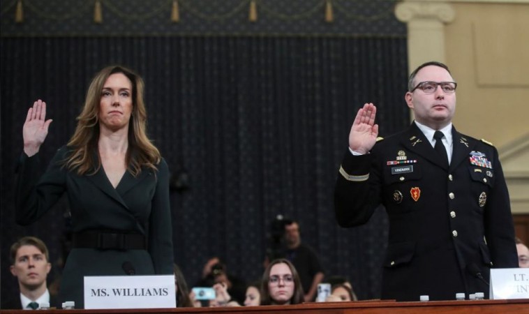 Jennifer Williams, a special adviser to Vice President Mike Pence for European and Russian affairs and Alexander Vindman, director for European Affairs at the National Security Council, are sworn in to testify before a House Intelligence Committee hearing as part of the impeachment inquiry into US President Donald Trump on Capitol Hill in Washington, US, November 19, 2019. impeachment inquiry