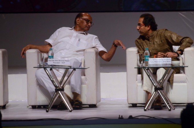 NCP chief Sharad Pawar interacts with Shiv Sena chief Uddhav Thackeray during the Centenary celebration ceremony of Saraswat Bank in Mumbai on Sept 15, 2018. Sharad Pawar uddhav thackeray