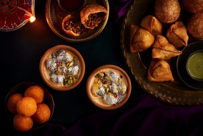 Indian sweets and savouries laced with cashew nuts originating from the country on Emirates flight menu. world cashew day