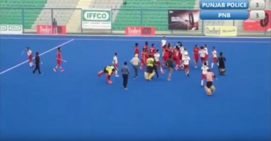Players of the two teams fight during Nehru Cup final Hockey fight