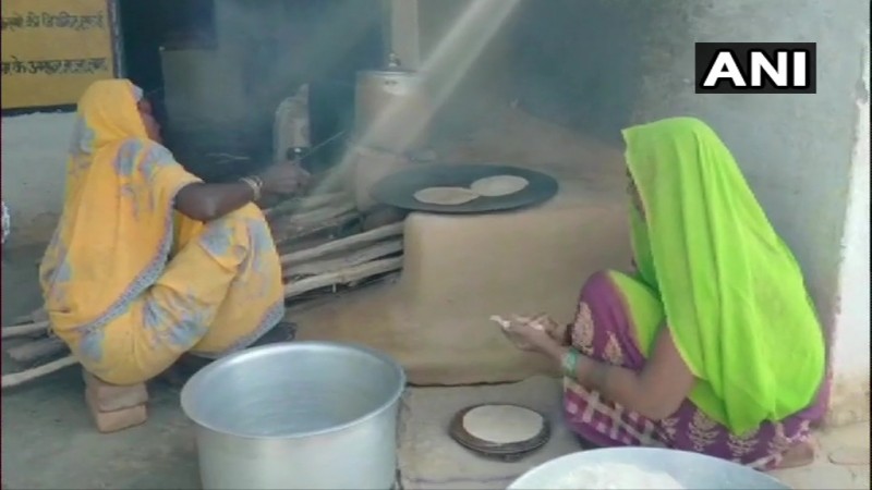 Image: Staff preparing mid day meals in UP government school. ANI UP mid day meal