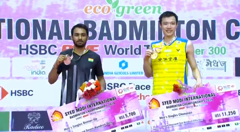 Wang Tzu Wei and Sourabh Verma with their trophies Syed Modi International