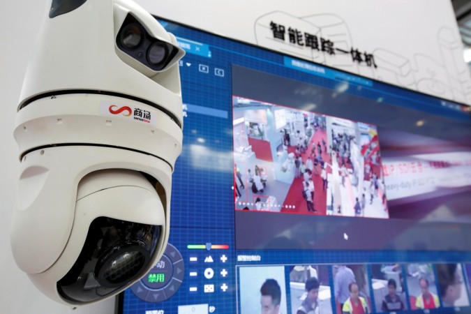 Facial recognition technology is shown at the SenceTime Group booth during the China Public Security Expo. Facial recognition
