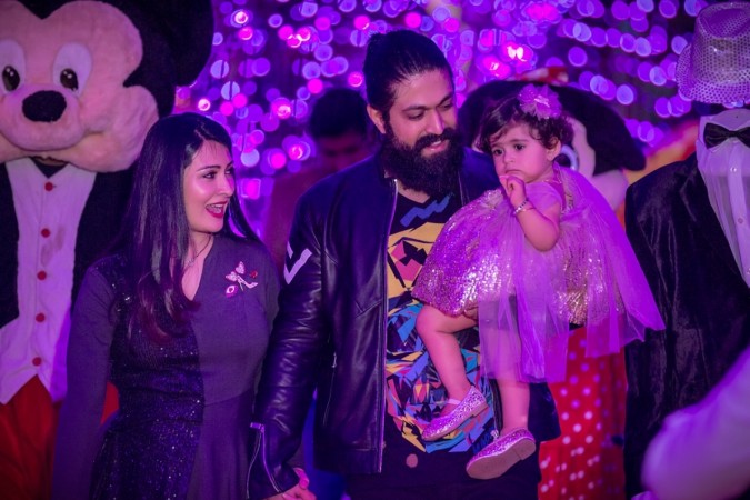 Radhika Pandit and Yash with their daughter Ayra at her first birthday party. Yash and Radhika Pandit