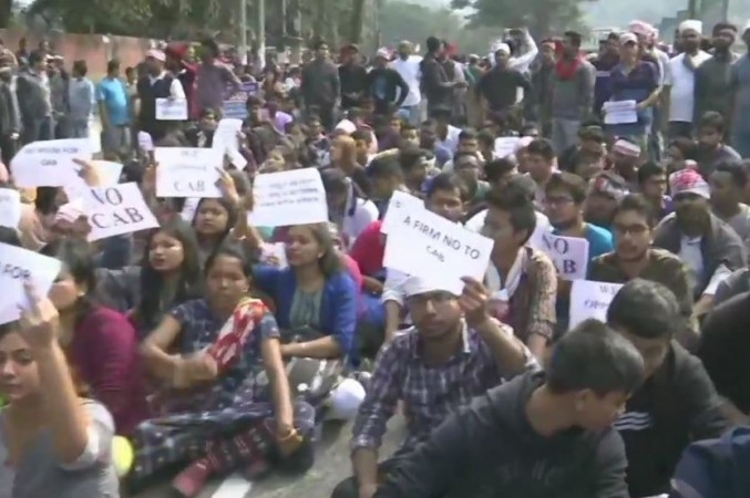 If their travel documents like passport and visa are not in order or are not available, still they can apply for Indian citizenship if they were persecuted back home. Assam protest