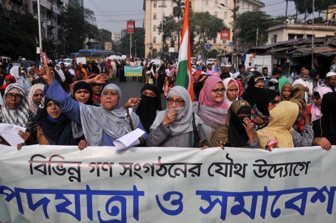 Members of Muslim community participate in a protest rally against Citizenship Amendment Bill (CAB) and NRC, in Kolkata on Dec 13, 2019 Members of Muslim community participate in a protest rally against CAB