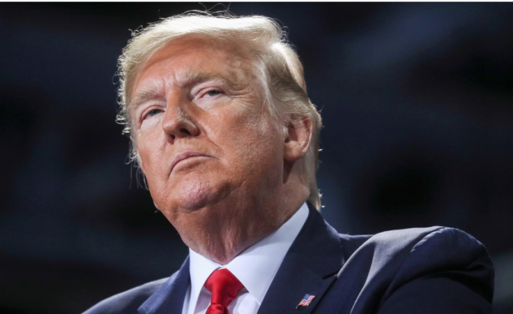 US President Donald Trump looks on during a campaign rally in Battle Creek, Michigan, US, December 18, 2019. Donald Trump