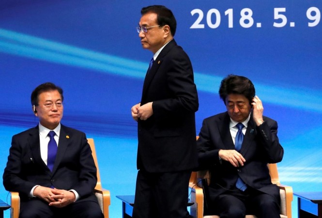 Japan's Prime Minister Shinzo Abe, South Korea's President Moon Jae-in and China's Premier Li Keqiang attend the 6th JAPAN-CHINA-KOREA Business Summit in Tokyo, Japan. JAPAN-CHINA-KOREA