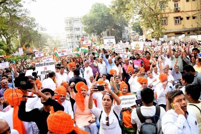 BJP workers and supporters participate in a rally organised by the party in support of the Citizenship Amendment Act (CAA). Citizenship Act protests