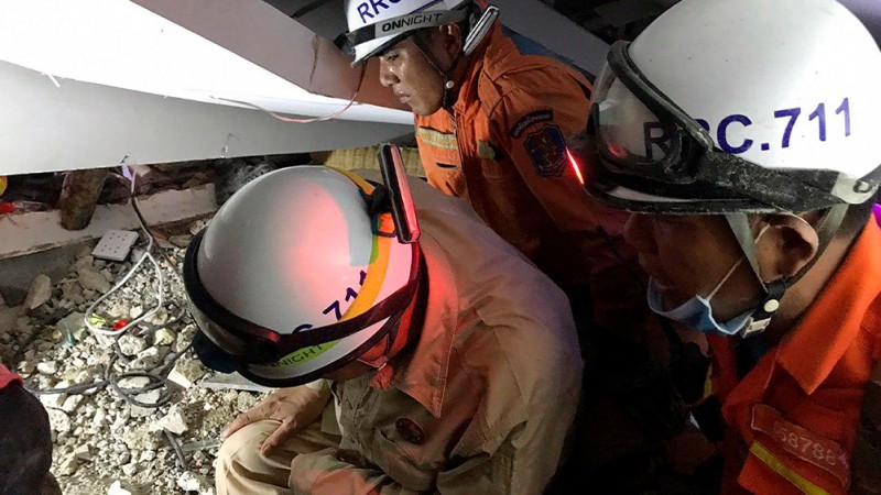 A rescue team searches for trapped workers at a collapsed building, which was under construction in Kep, Cambodia January 3, 2020. A rescue team searches for trapped workers at a collapsed building, which was under construction in Kep, Cambodia January 3, 2020.