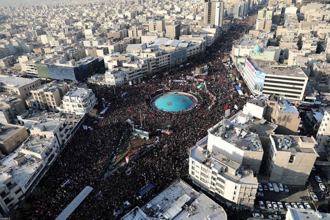 People attend a funeral procession for Qassem Soleimani in Tehran, Iran. Qassem Soleimani funeral