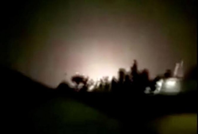 An explosion is seen following missiles landing at what is believed to be Ain al-Asad Air Base in Iraq. Iran attacks US forces