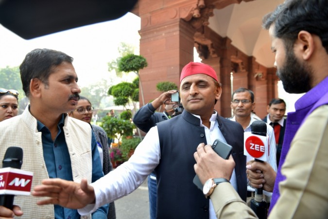 Samajwadi Party MP Akhilesh Yadav talks to the media at Parliament in New Delhi. Akhilesh Yadav