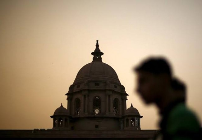 A commuter walks past the building of India's Ministry of Finance. Finance ministry