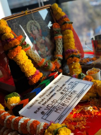 Clap board from the puja ceremony. fighter