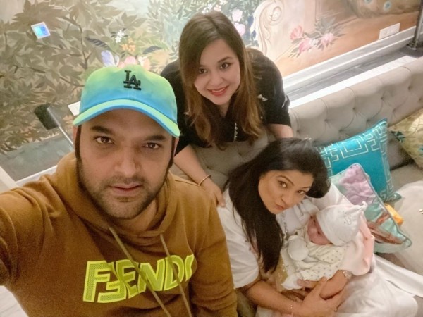 Richa Sharma cradles Kapil Sharma's baby daughter Anayra in her arms Richa Sharma