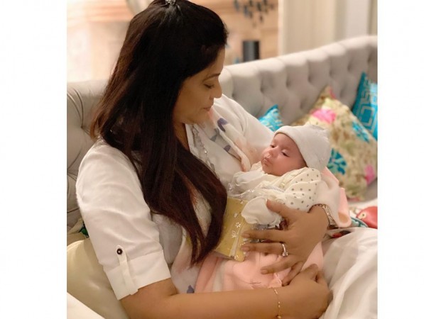 Richa Sharma cradles Kapil Sharma's baby daughter Anayra in her arms Richa Sharma