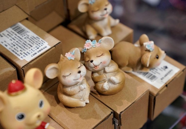FILE PHOTO: Lunar New Year of the Rat decorations are displayed for sale at a shopping mall in Beijing, China December 31, 2019. REUTERS/Jason Lee Year of the rat