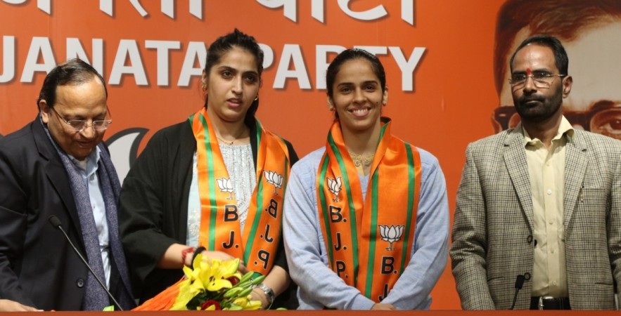 New Delhi: BJP General Secretary Arun Singh with Badminton star Saina Nehwal and her elder sister Abu Chandranshu Nehwal who joined the BJP, in New Delhi on Jan 29, 2020. saina nehwal