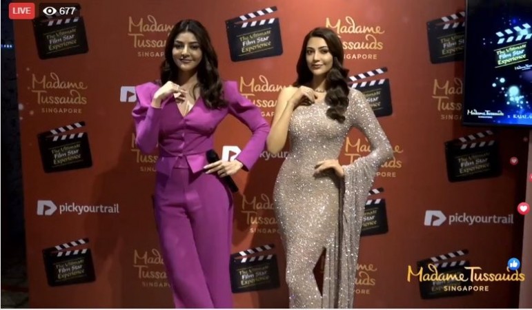 Kajal Aggarwal poses with her wax statue at Madame Tussauds Singapore Kajal Aggarwal poses with her wax statue at Madame Tussauds Singapore
