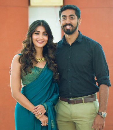 Original pic of Pooja with her brother Rishabh Hegde. Pooja Hegde