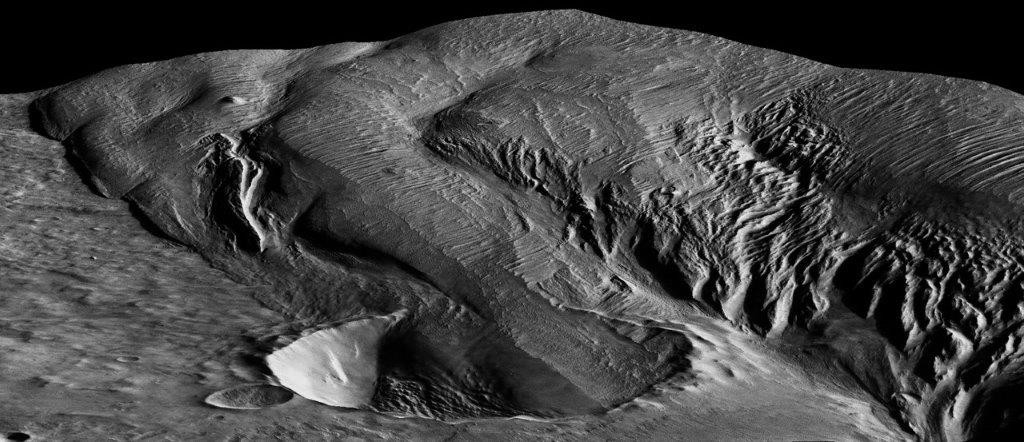 A 13-kilometer diameter crater being infilled by the Medusae Fossae Formation Medusae Fossae Formation