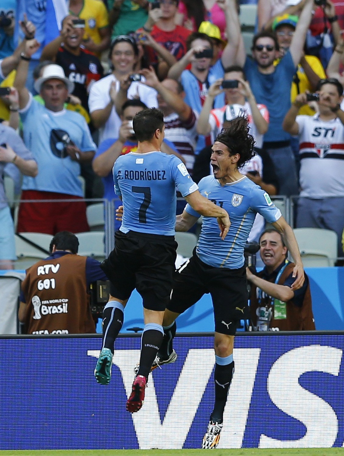 Uruguay's Edinson Cavani celebrates a goal with teammate Cristian Rodriguez Uruguay v Costa Rica