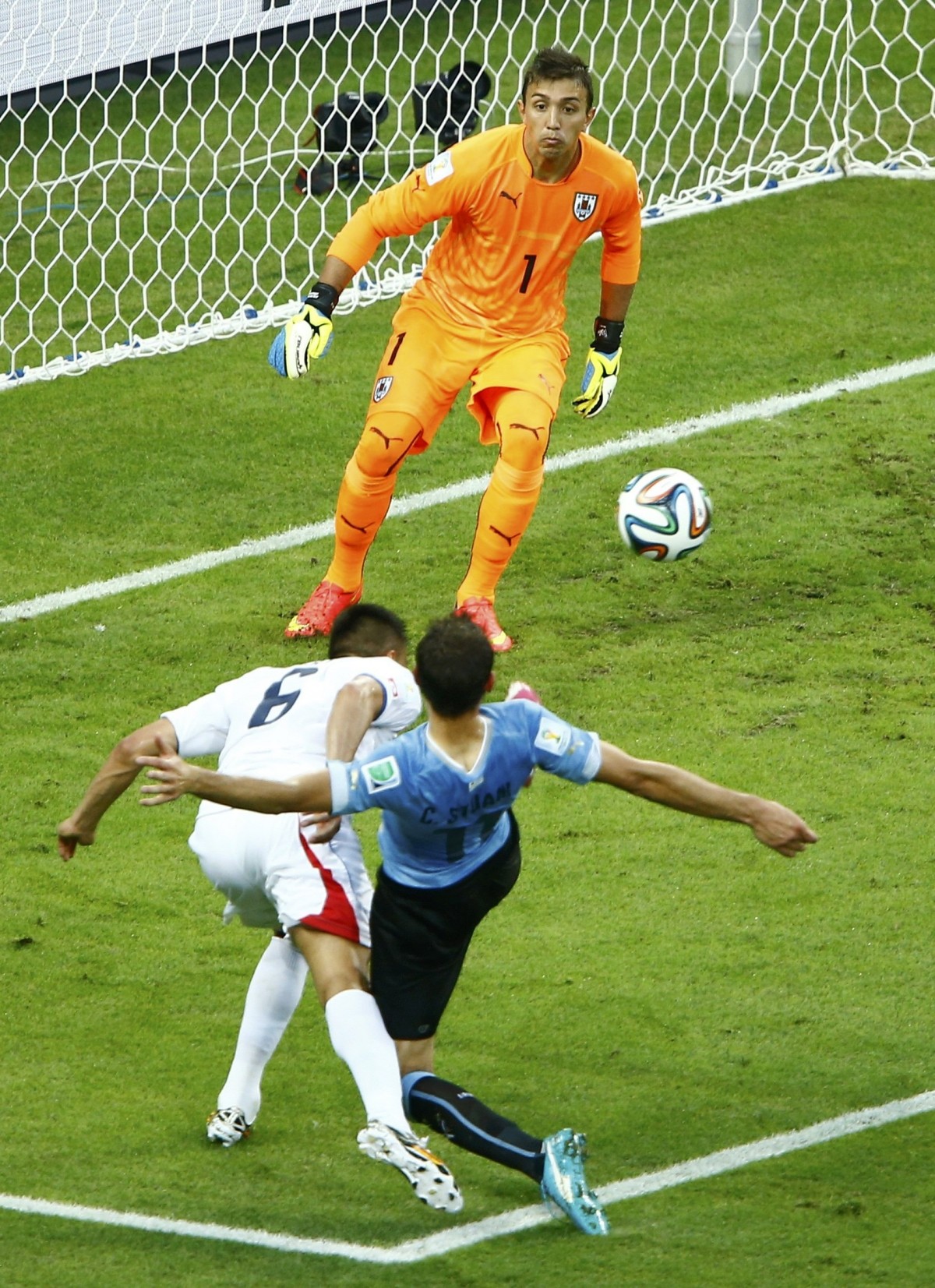 Costa Rica's Duarte heads to score a goal past Uruguay's goalkeeper Muslera Uruguay v Costa Rica