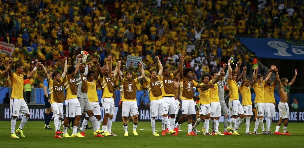 Brazil's players acknowledge the crowd after winning their 2014 World Cup Group A match against Cameroon at the Brasilia national stadium in Brasilia Cameroon v Brazil