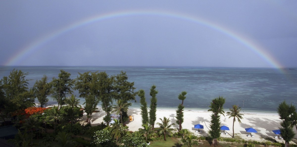 A rainbow over the sea is seen during Emperor Akihito and Empress Michiko's visit to their island on June 27, 2005 in Saipan, Northern Mariana Islands. Northern Mariana Islands