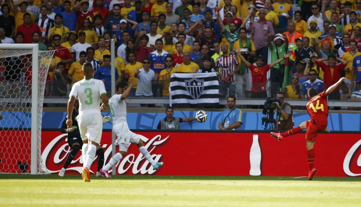 Belgium's Mertens shoots to score against Algeria during their 2014 World Cup Group H soccer match at the Mineirao stadium in Belo Horizonte Belgium v Algeria