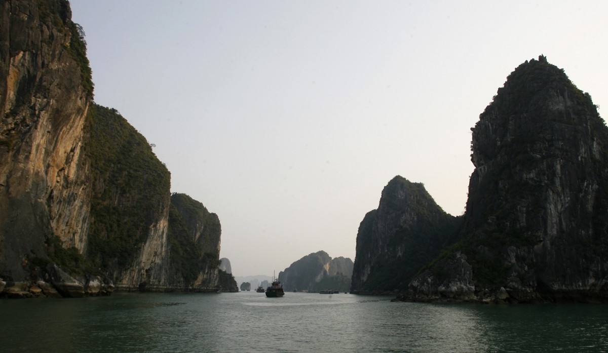 Boats sail between limestone islets in Ha Long Bay, 150 km (93 miles) from Hanoi March 8, 2008. Vietnam