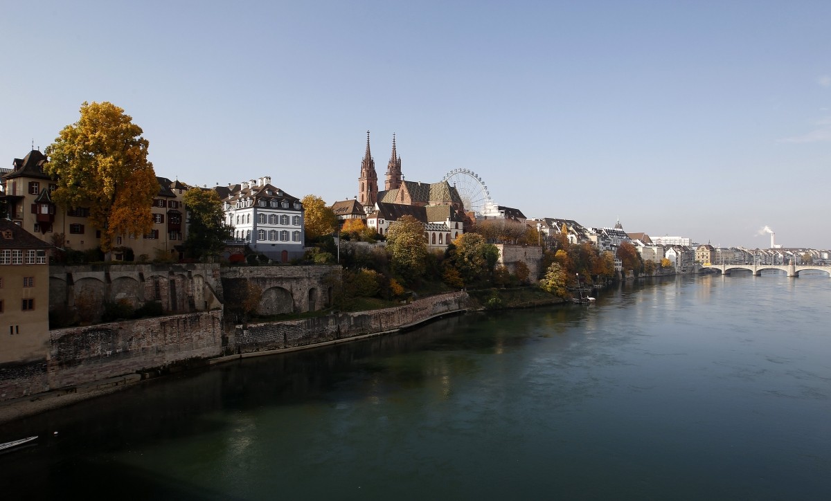 A general view shows the city of Basel and the Rhine River November 1, 2011. In the centre is seen the Basler Muenster church. Basel, Germany