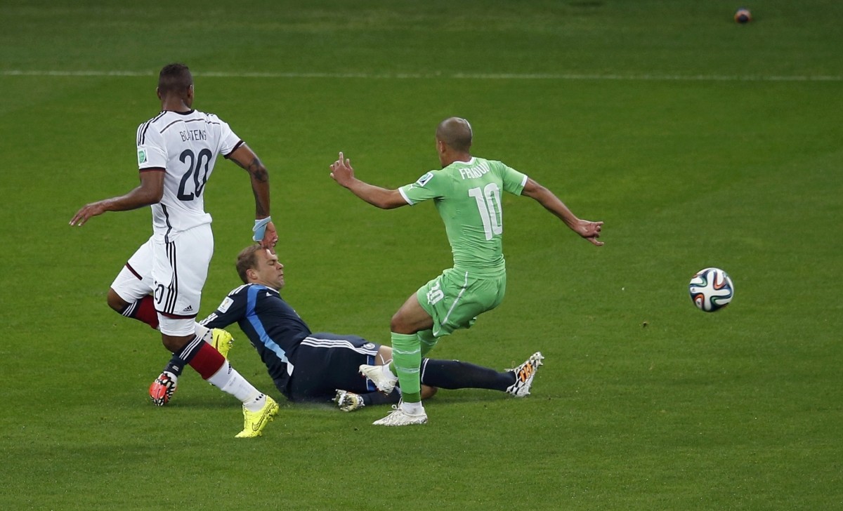Germany's goalkeeper Neuer saves the ball during the 2014 World Cup round of 16 game between Germany and Algeria at the Beira Rio stadium in Porto Alegre Germany vs Algeria